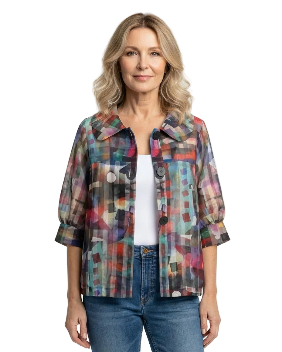 Woman wearing a colorful plaid jacket with white tank, and blue jeans on a white background