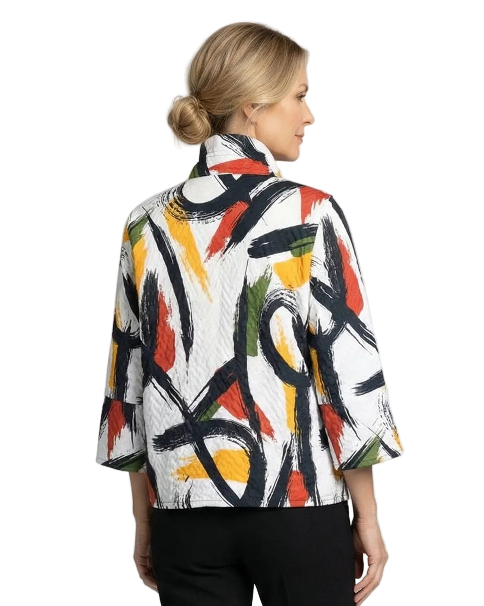 Woman wearing a colorful abstract-patterned jacket on a white background