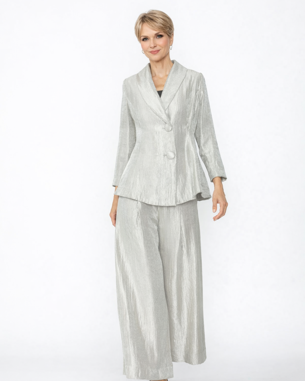 Woman wearing a light gray suit on a white background