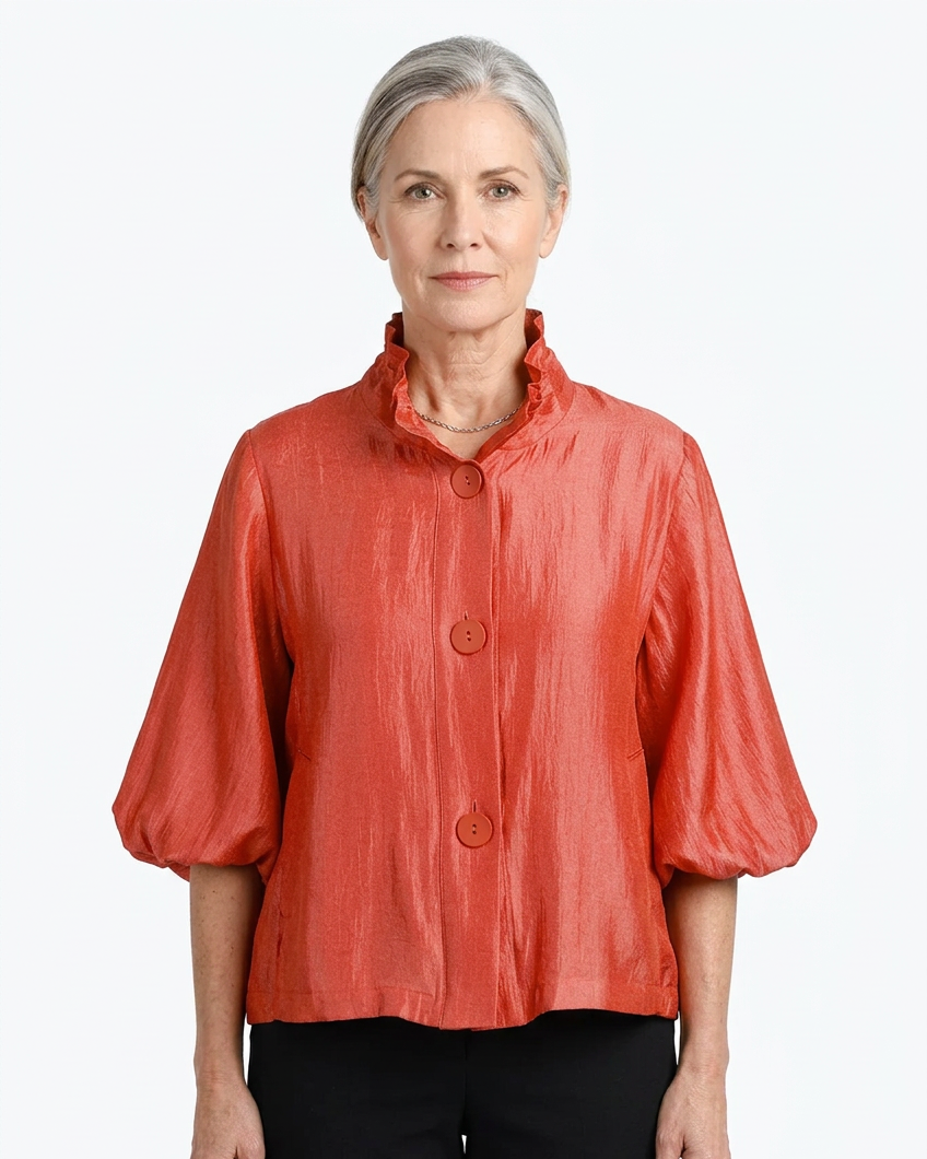 Mature model wearing the coral red top